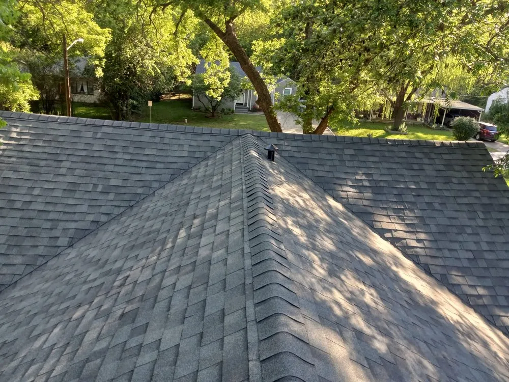 Slide of Rey’s Roofing