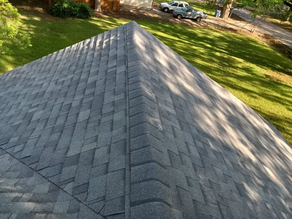 Slide of Rey’s Roofing