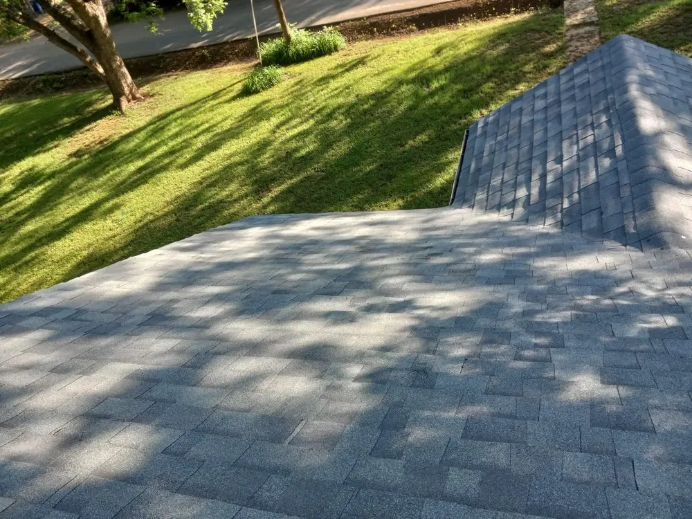 Slide of Rey’s Roofing