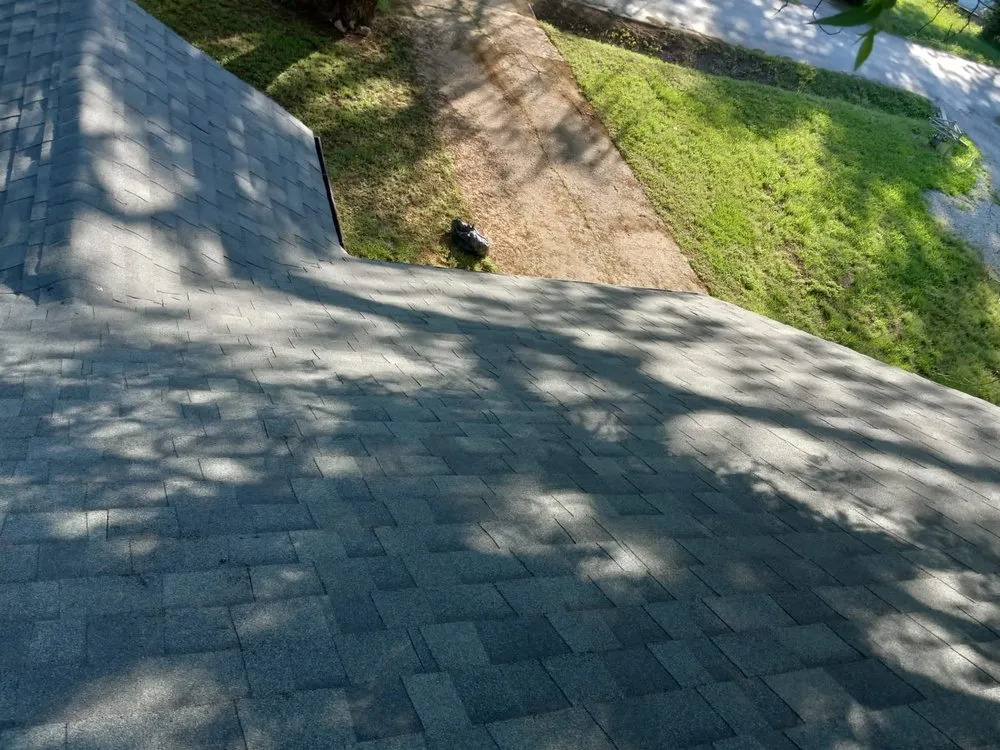 Slide of Rey’s Roofing