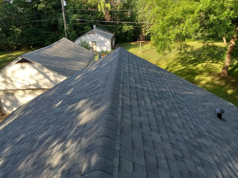 Slide of Rey’s Roofing