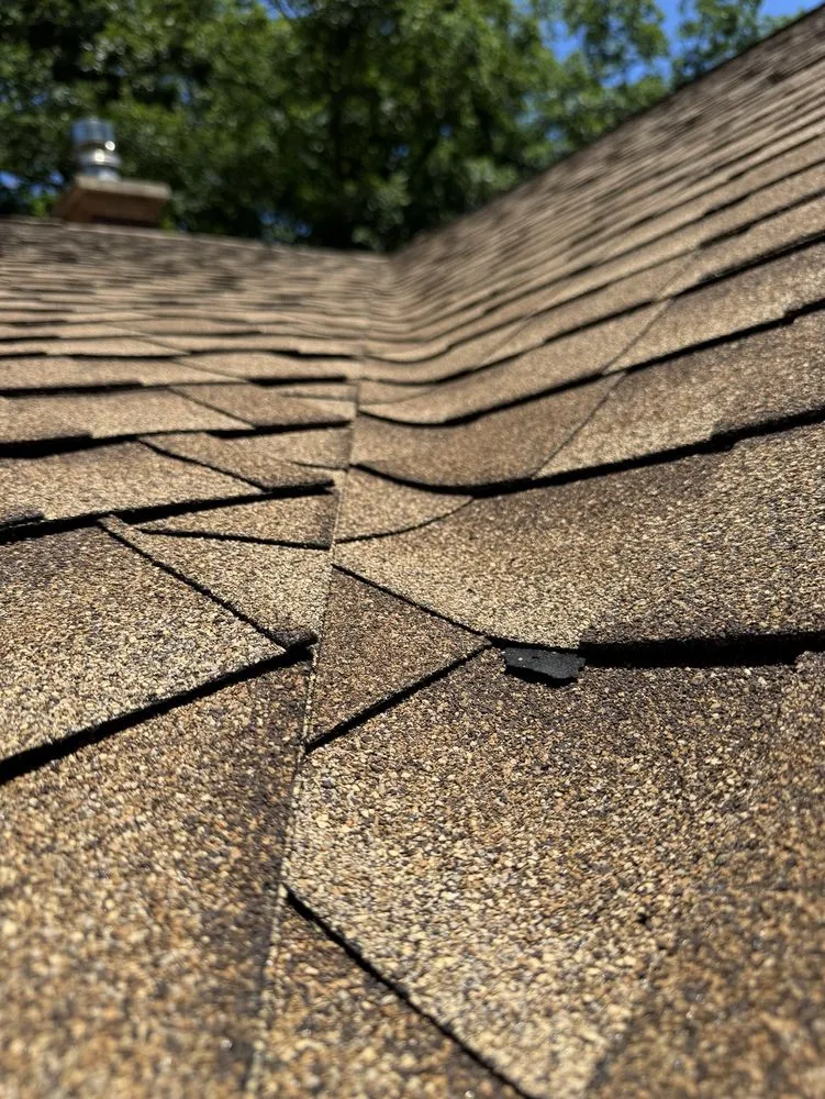 Slide of Reyzek Roofing