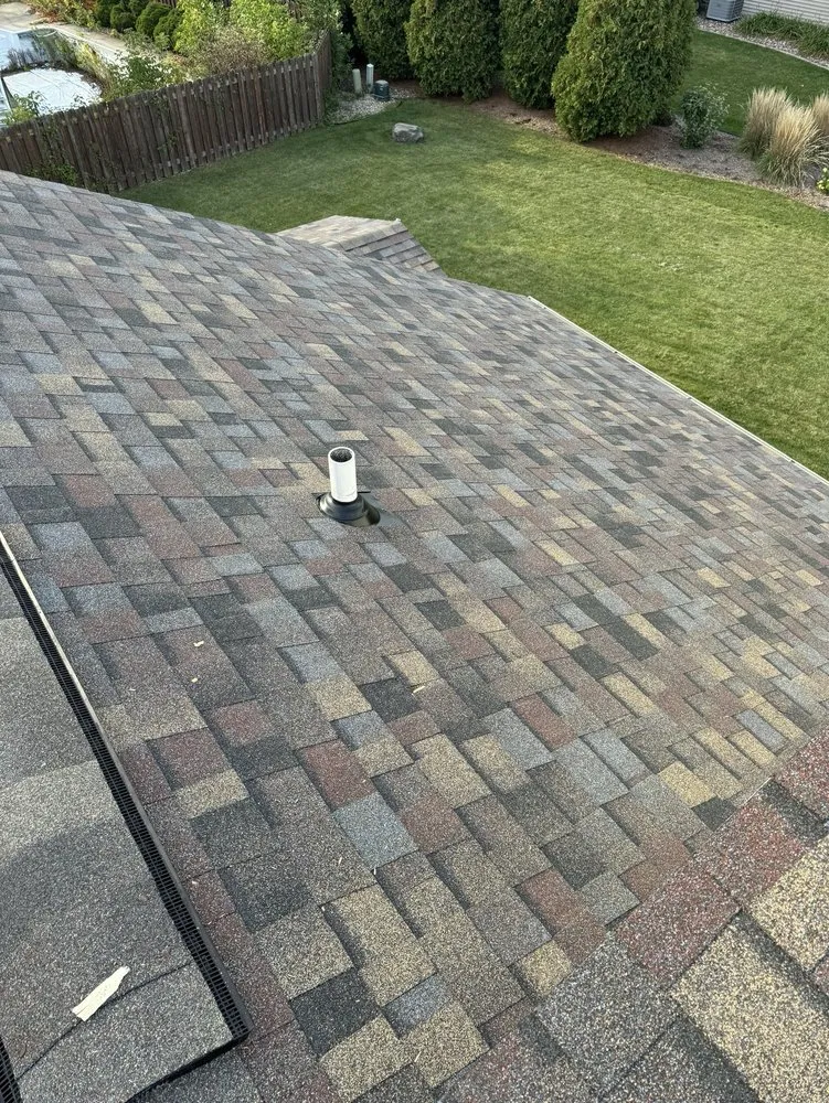 Slide of Reyzek Roofing