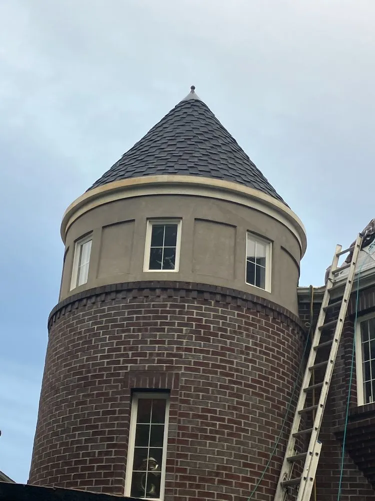 Slide of RG Roofing Pros