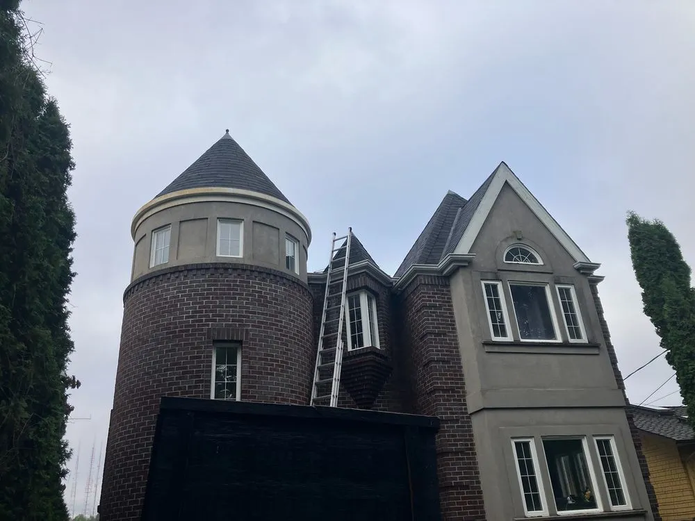 Slide of RG Roofing Pros