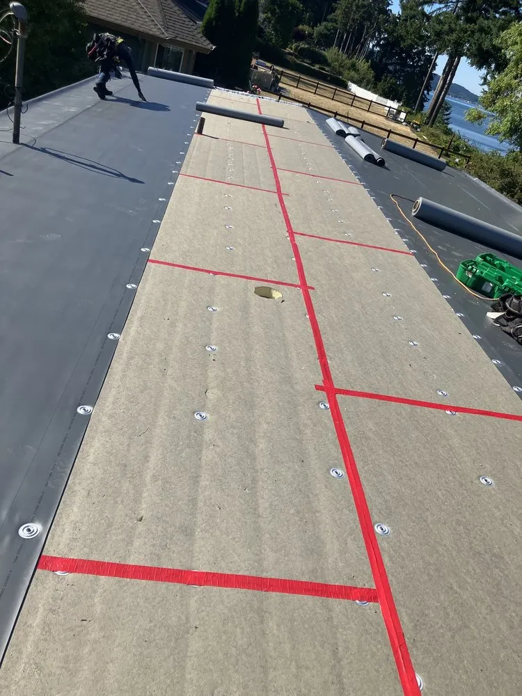 Slide of RG Roofing Pros