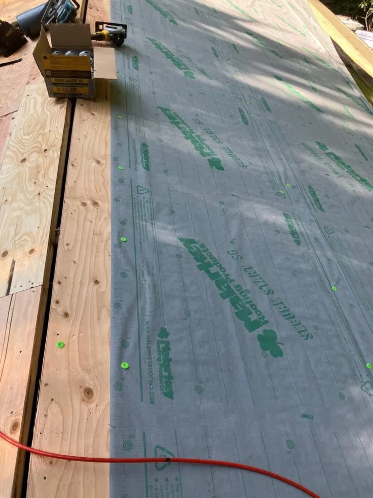 Slide of RG Roofing Pros