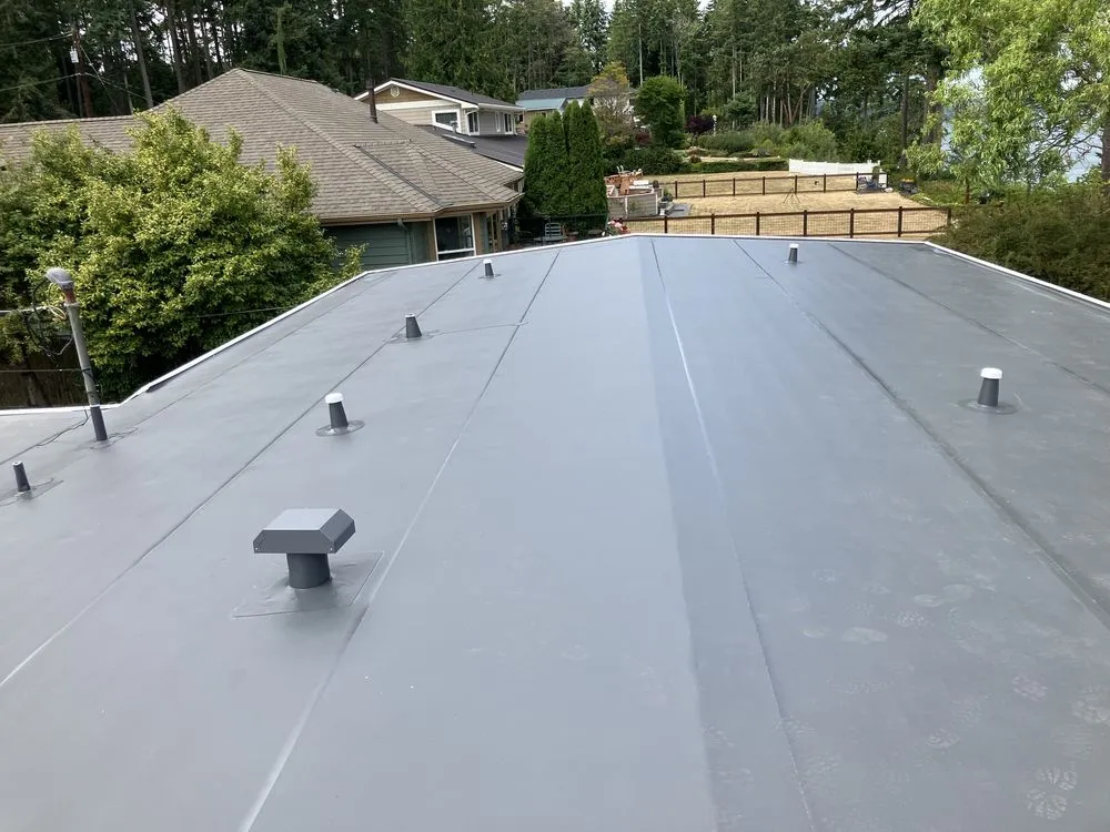 Slide of RG Roofing Pros