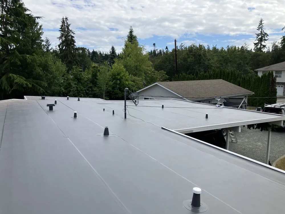 Slide of RG Roofing Pros