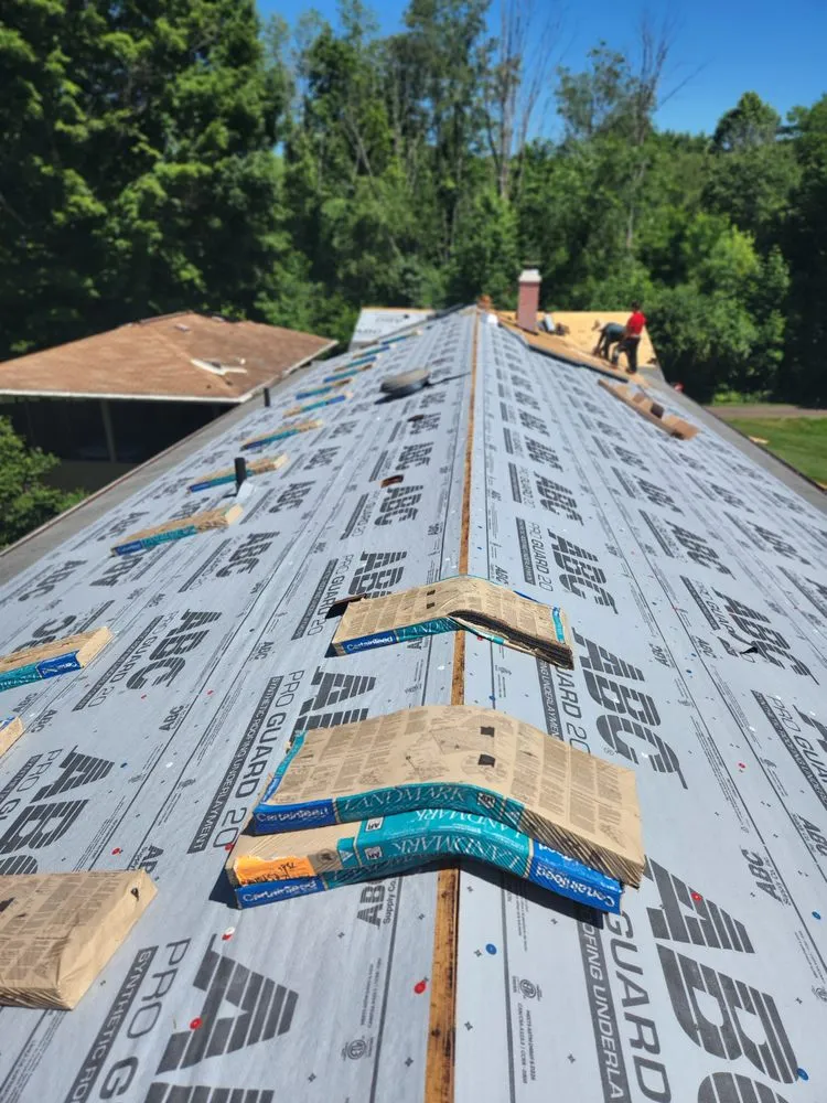 Slide of RGE Exteriors & Construction