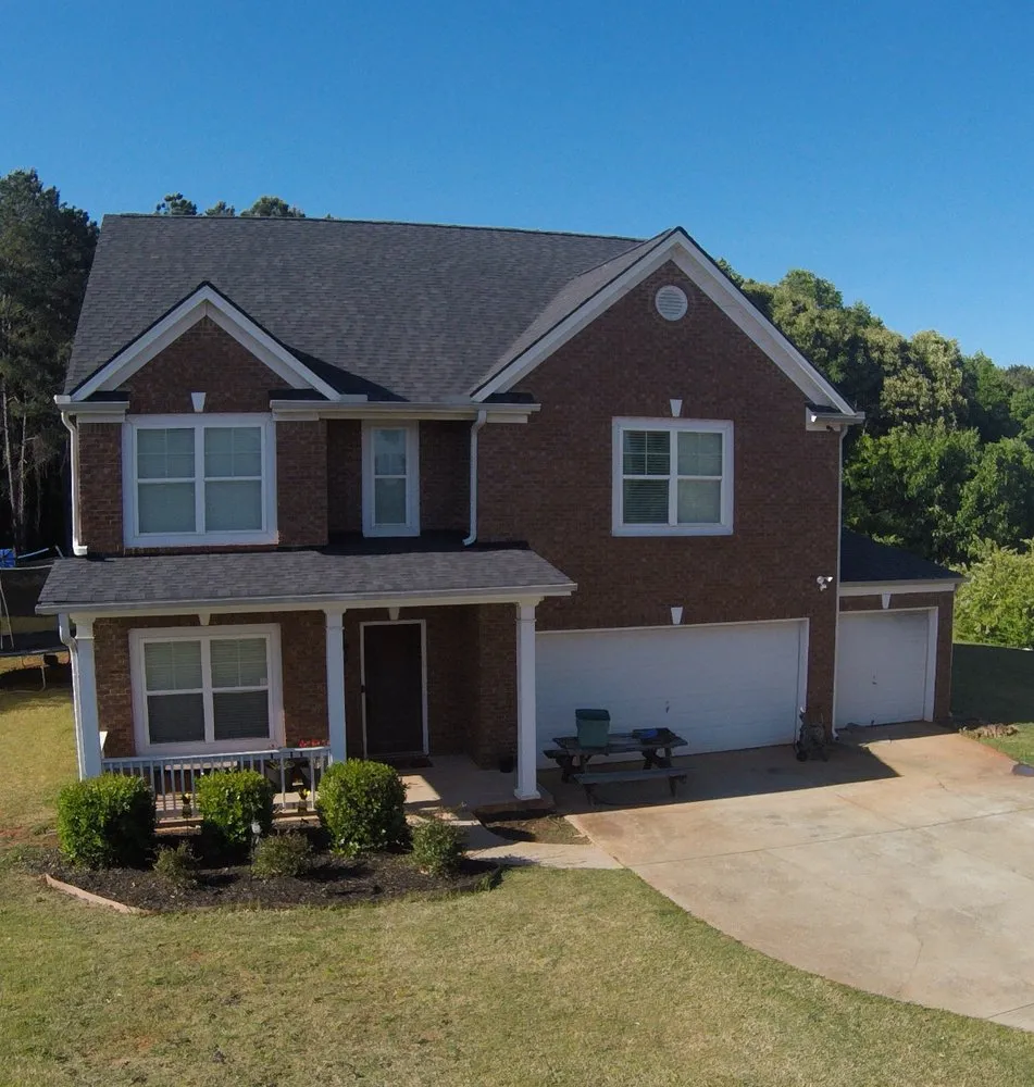 Slide of Rhino Roofing & Construction