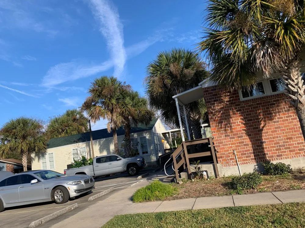 Slide of Rhino Roofing and Construction