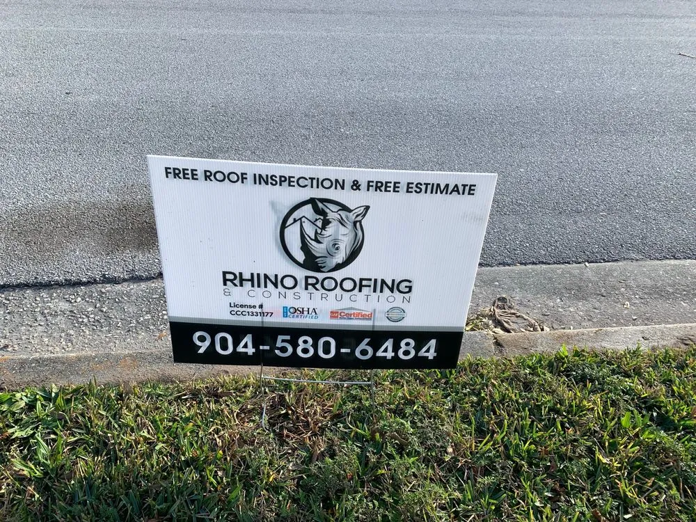 Slide of Rhino Roofing and Construction