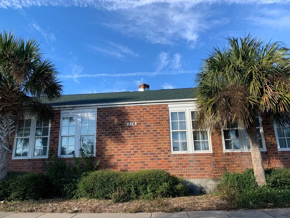 Slide of Rhino Roofing and Construction