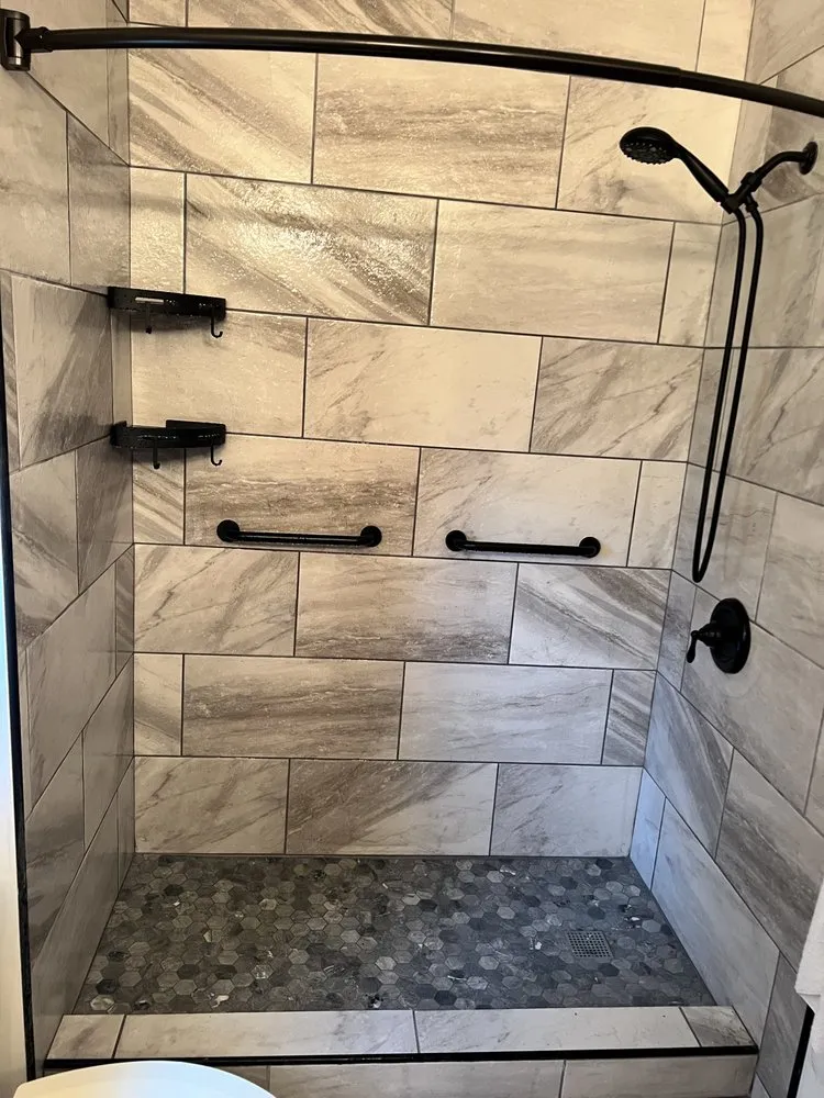 Slide of Rhino Roofing and Siding