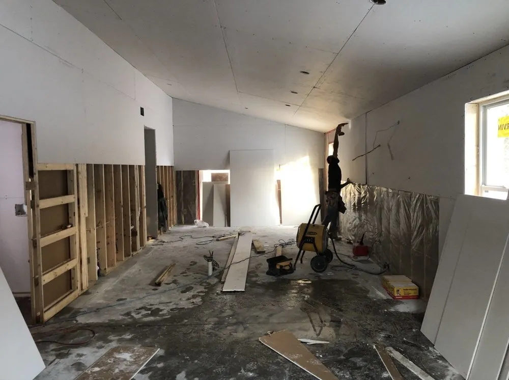 Slide of Rhino Roofing