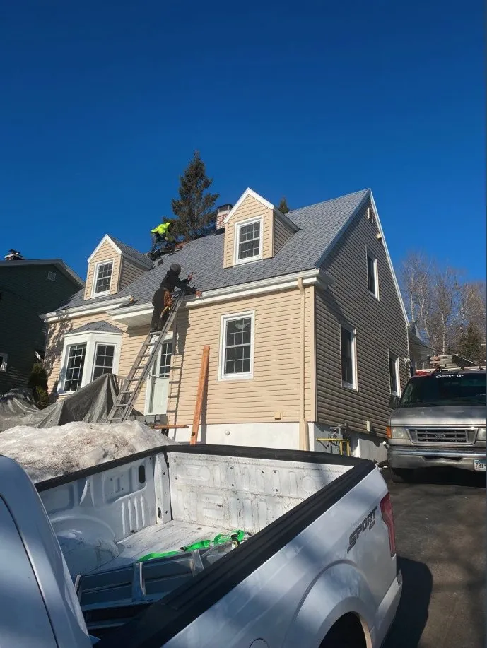 Slide of Rhino Roofing