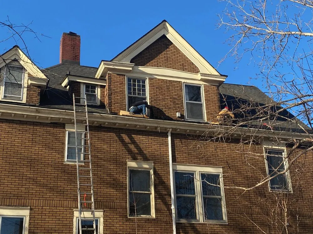 Slide of Rhino Roofing