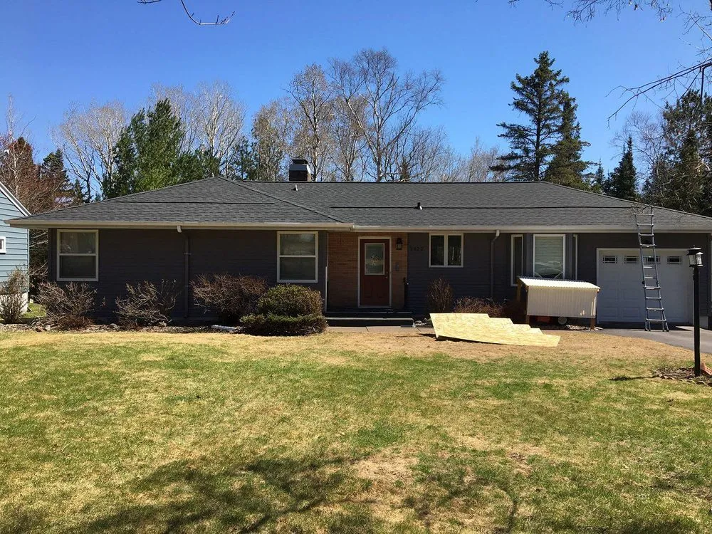 Slide of Rhino Roofing