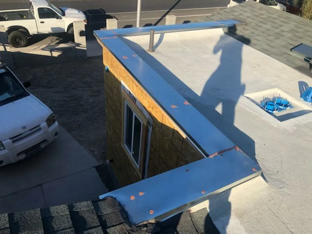 Slide of Rhino Roofing