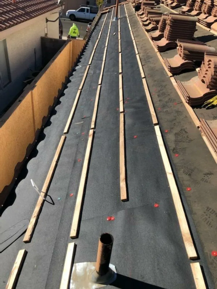 Slide of Rhino Roofing