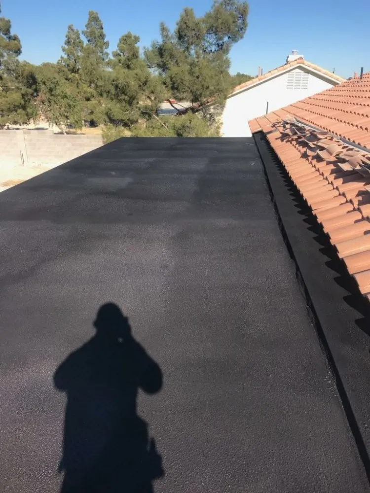 Slide of Rhino Roofing