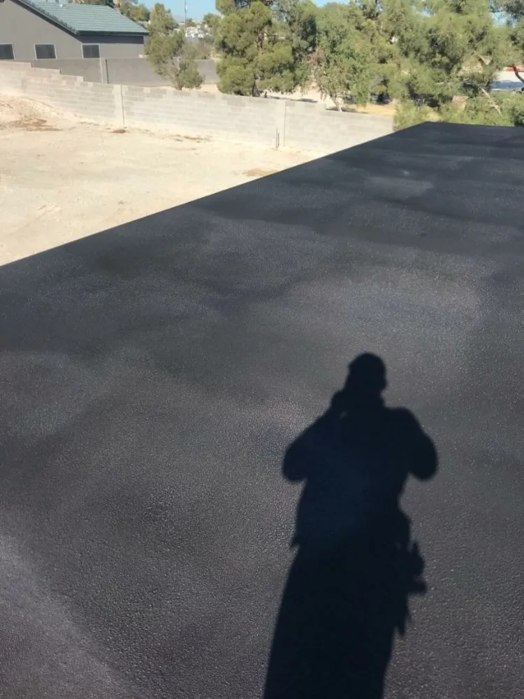 Slide of Rhino Roofing