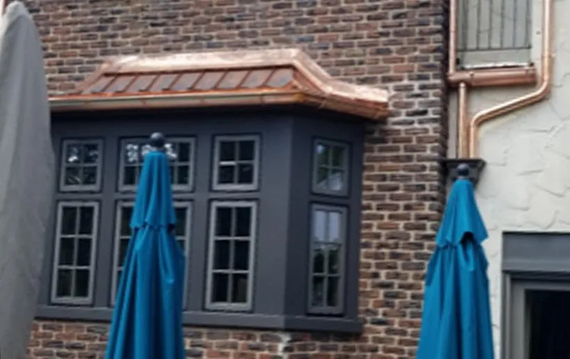 Slide of Rhino Roofing