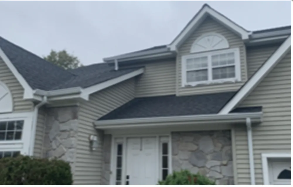 Slide of Rhino Roofing