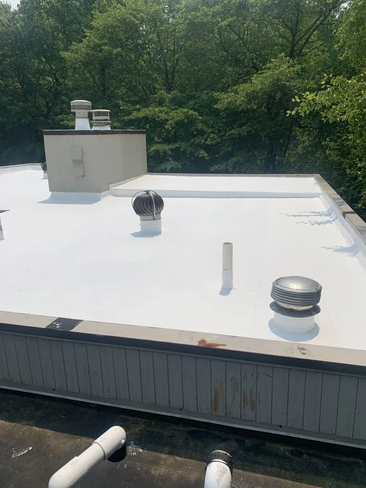 Slide of Rhino Roofing