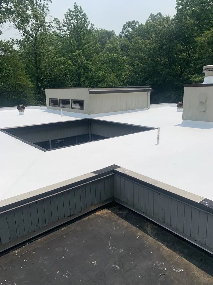 Slide of Rhino Roofing