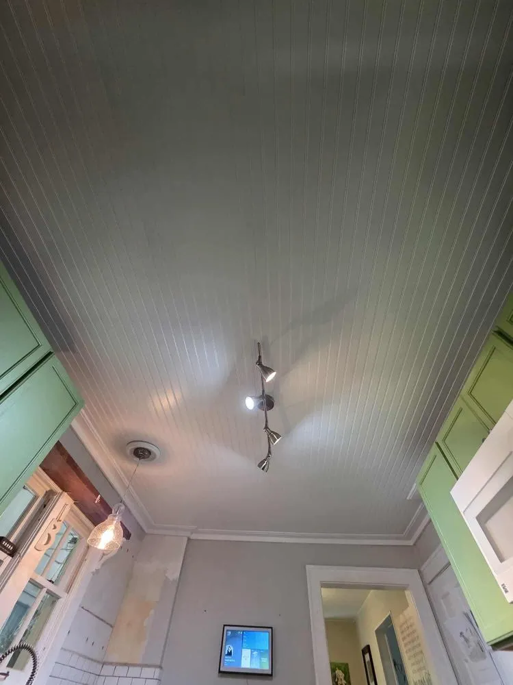 Slide of Rhino’s Roofing & Remodeling