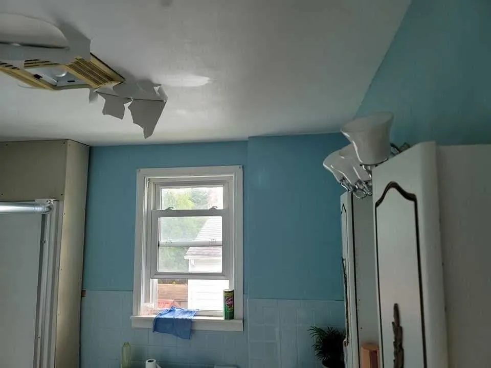 Slide of Rhino’s Roofing & Remodeling