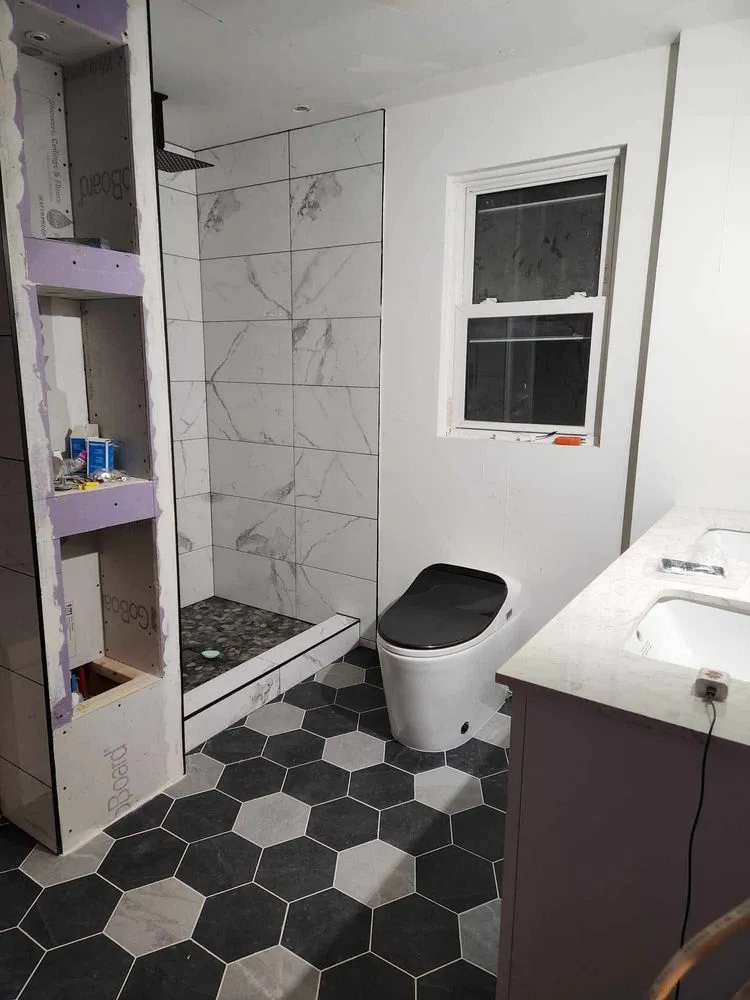 Slide of Rhino’s Roofing & Remodeling