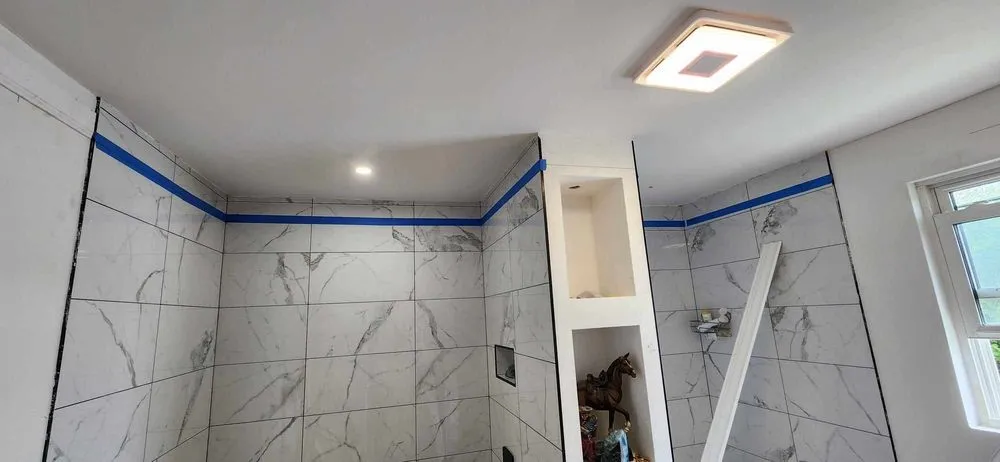 Slide of Rhino’s Roofing & Remodeling