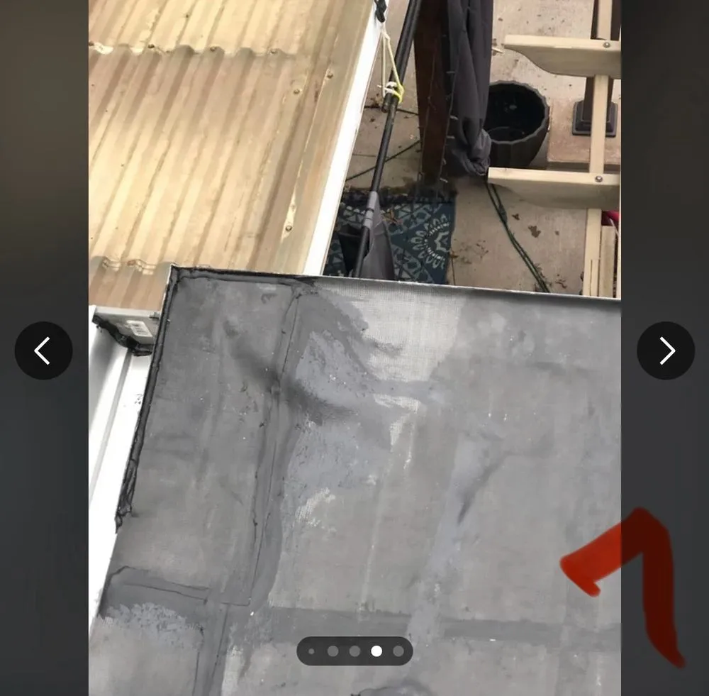 Slide of Rhoads Roofing