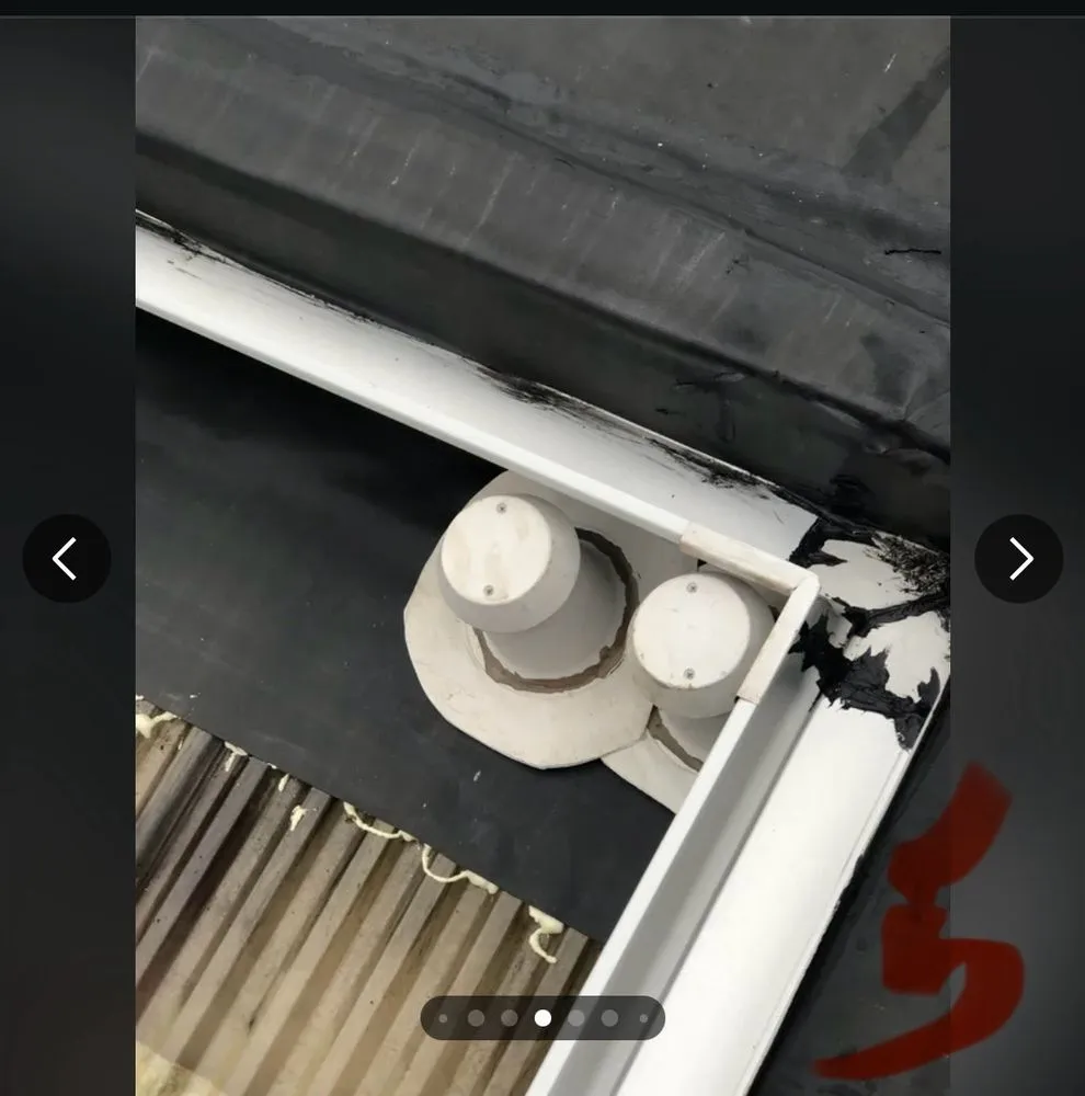 Slide of Rhoads Roofing