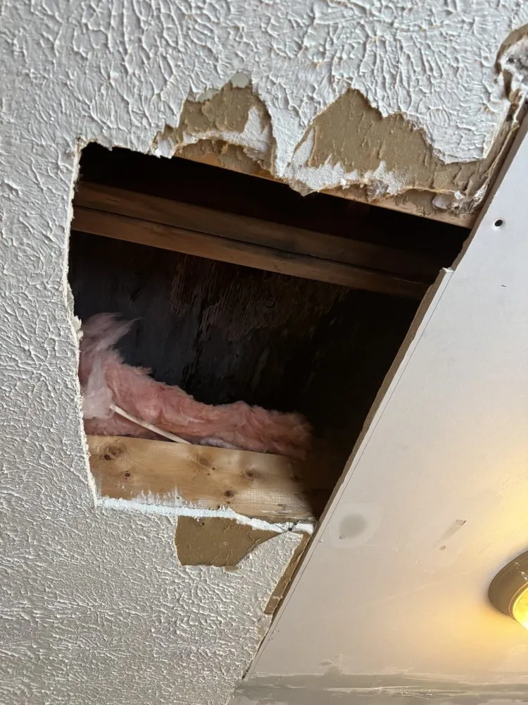 Slide of Rhodes Roofing And Remodeling