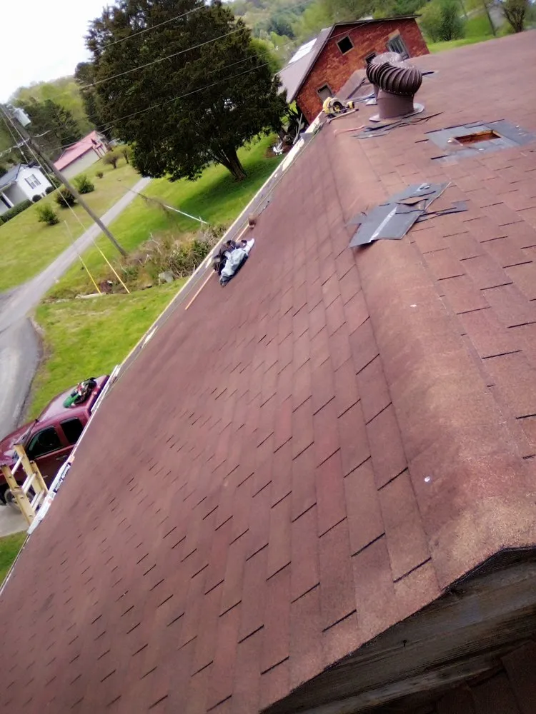 Slide of RHW Roofing & More