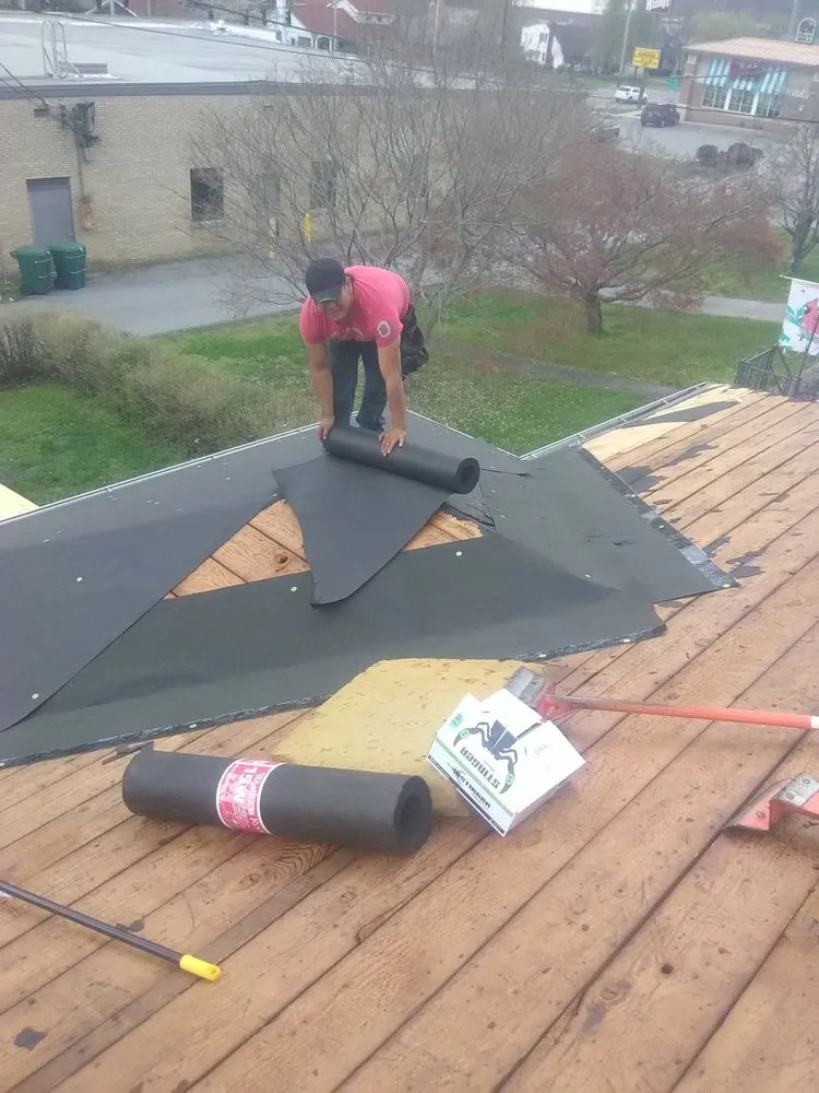 Slide of RHW Roofing & More