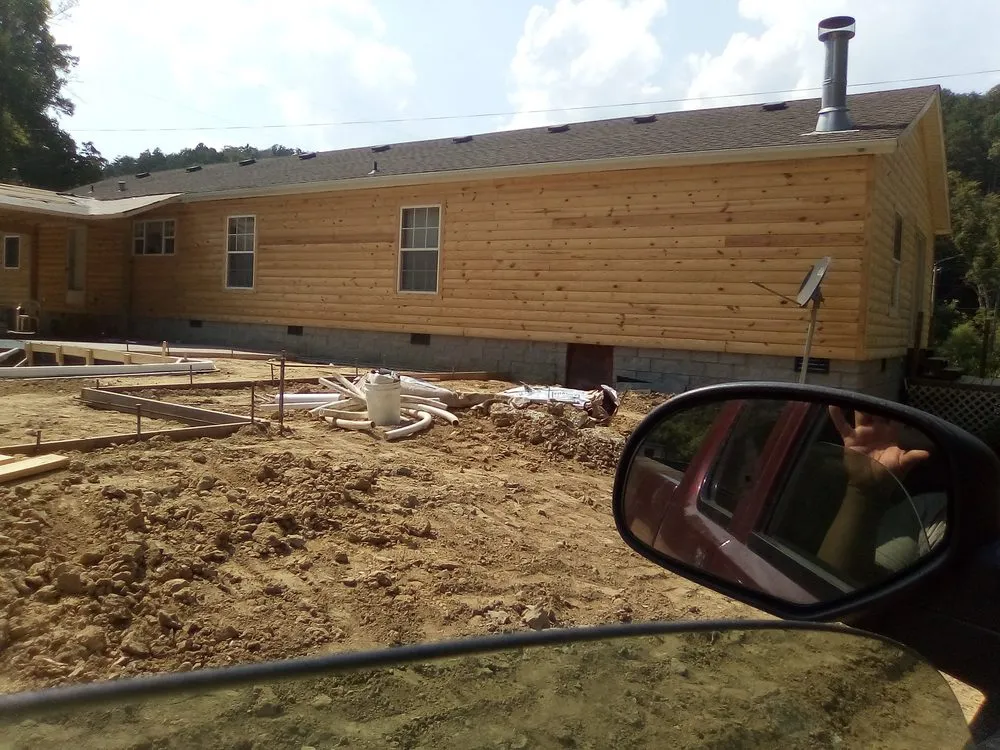 Slide of RHW Roofing & More