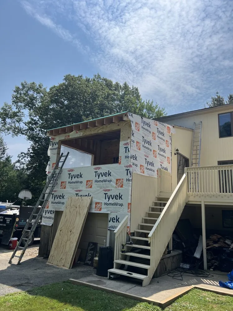 Slide of RI Property MGT & Construction