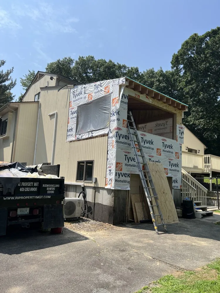 Slide of RI Property MGT & Construction