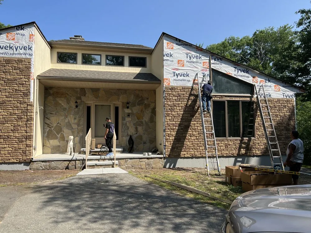 Slide of RI Property MGT & Construction