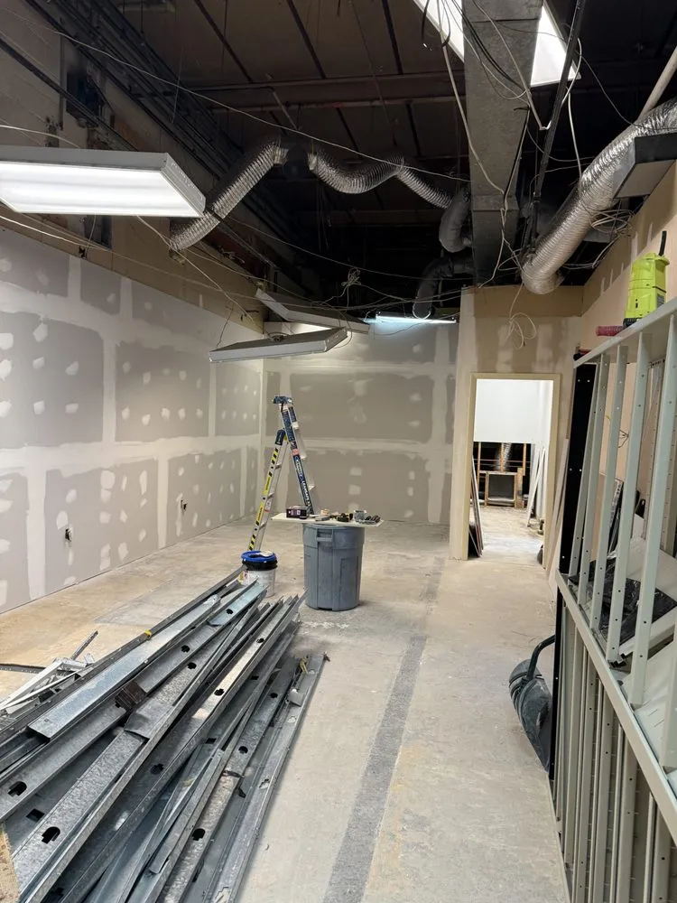 Slide of RI Property MGT & Construction