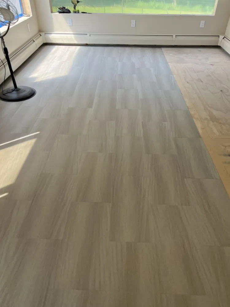 Slide of RI Property MGT & Construction