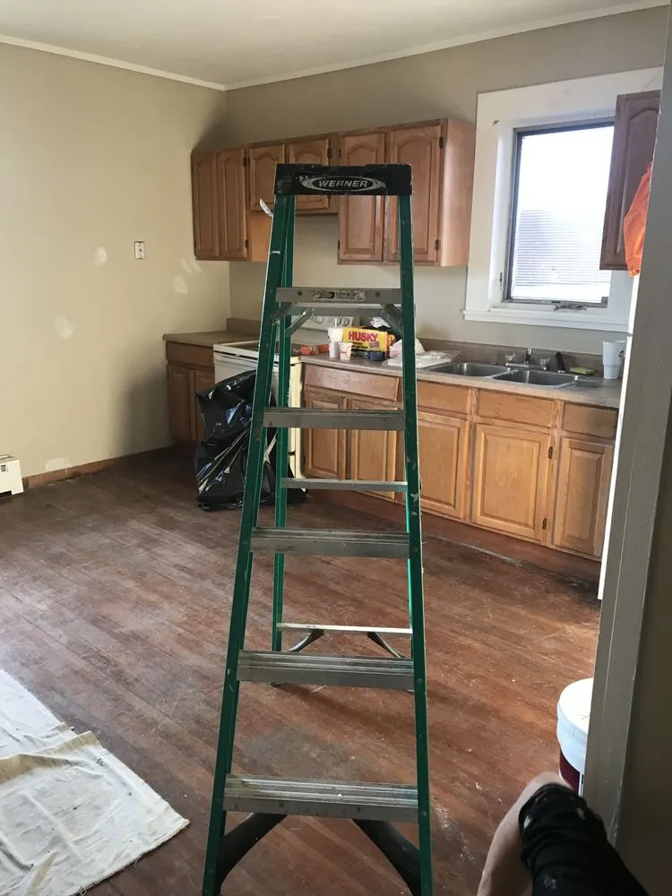 Slide of RI Property MGT & Construction