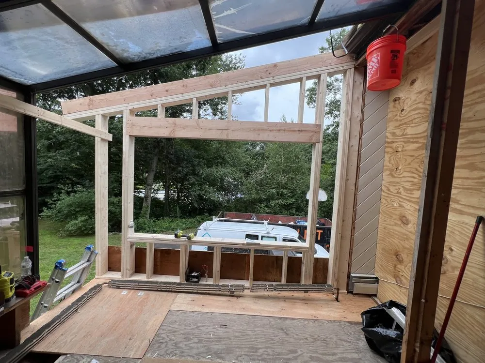 Slide of RI Property MGT & Construction