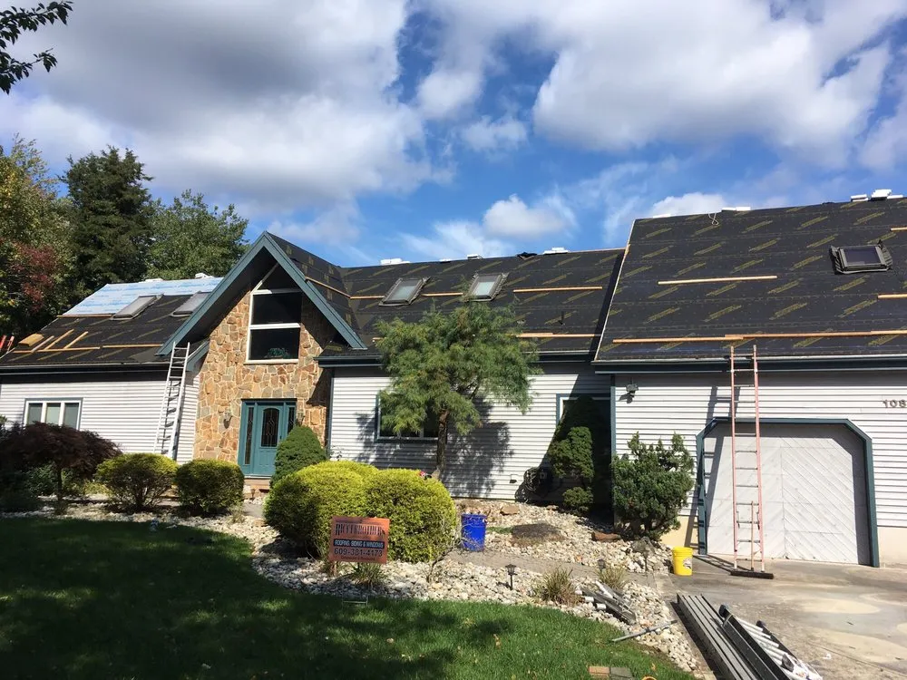 Professional storm damage roof repair in Maple Shade, PA by Ricci Brothers Roofing