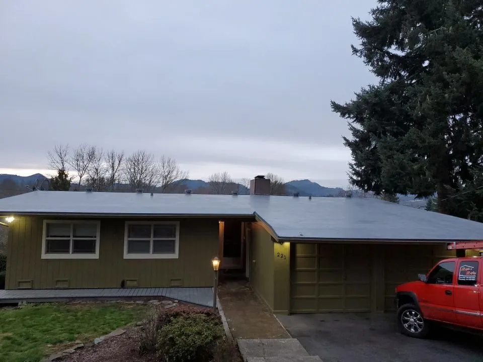 Slide of Rich Rayburn Roofing